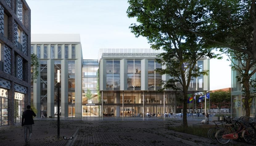 zijkant van het nieuwe gemeentehuis met C. aan de rechterkant